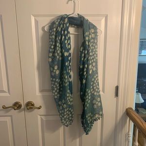 Blue polka dotted scarf